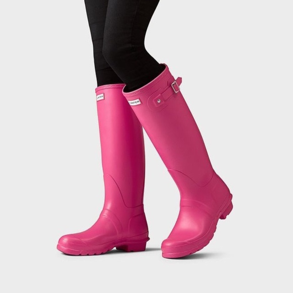 Hot pink knee high Hunter rain boots